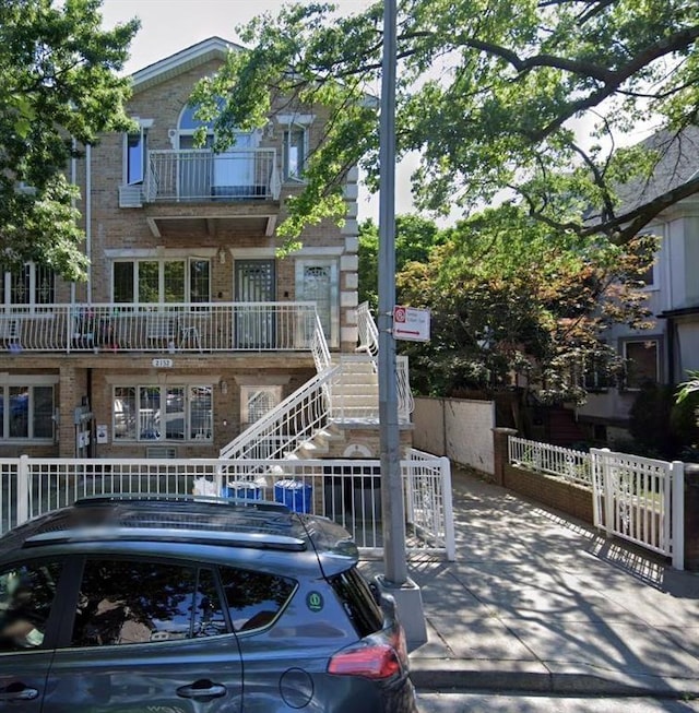 2152 81st St Unit 3A, Brooklyn, NY 11214 - view of front of property featuring brick siding and stairs