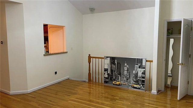 2152 81st St Unit 3A, Brooklyn, NY 11214 - corridor with wood finished floors and an upstairs landing