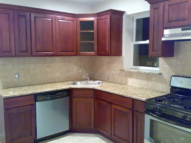 kitchen with sink, stainless steel dishwasher, gas range oven, backsplash, and extractor fan