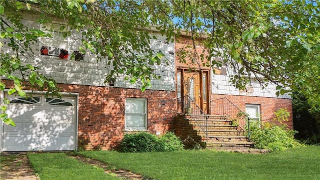 exterior space featuring a garage and brick siding