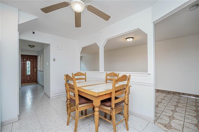 dining room featuring ceiling fan