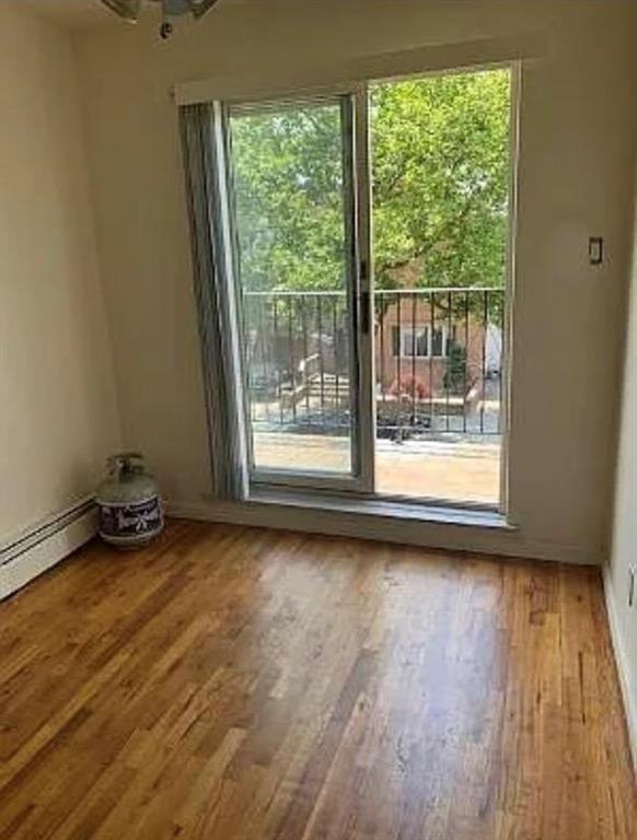 doorway to outside featuring hardwood / wood-style flooring