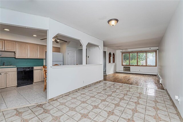 kitchen with a baseboard heating unit, a wall mounted AC, black dishwasher, white refrigerator, and light brown cabinets