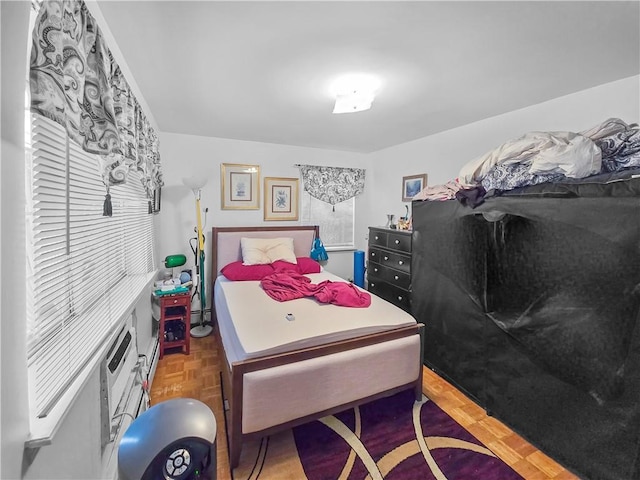 bedroom with parquet flooring