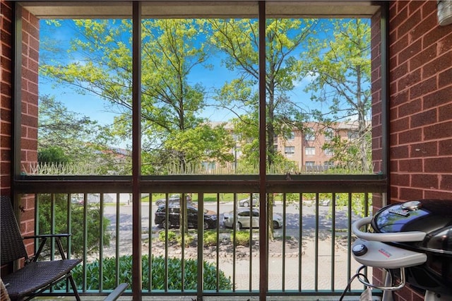 unfurnished sunroom with plenty of natural light