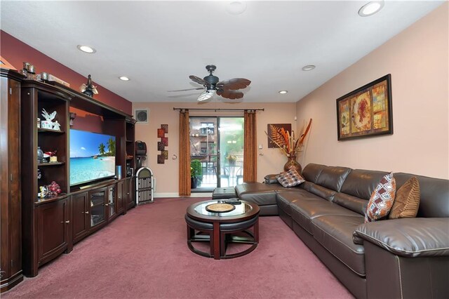 living room featuring carpet and ceiling fan