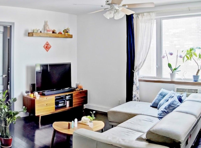 living room featuring ceiling fan and wood-type flooring