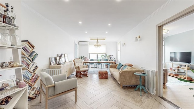 living room with light parquet floors, crown molding, a wall mounted air conditioner, and an inviting chandelier