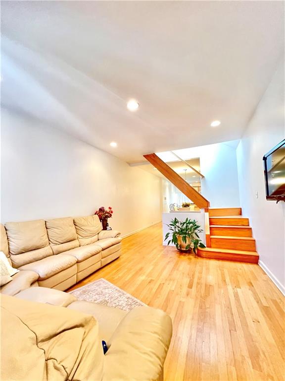 living room with hardwood / wood-style flooring