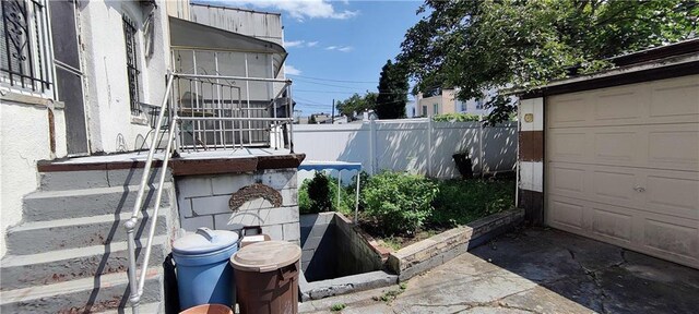 view of patio with a garage