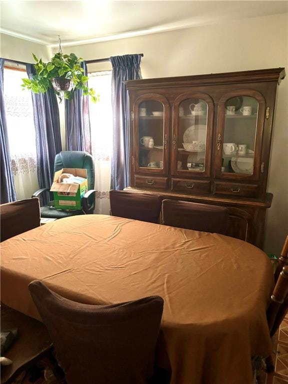 bedroom featuring multiple windows