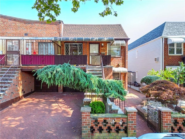 rear view of property with covered porch