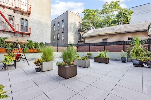 view of patio with fence