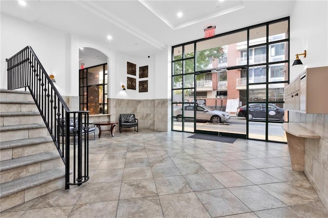728 Ocean View Ave Unit A2, Brooklyn, NY 11235 - lobby with stairway, recessed lighting, and a wall of windows