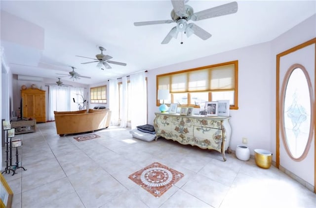 foyer featuring a wall unit AC and light tile patterned floors