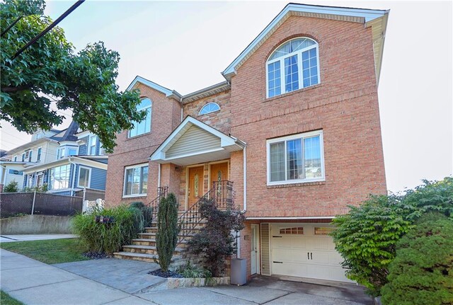 view of front of property featuring a garage