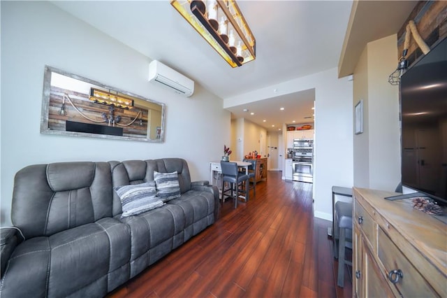 living area with dark wood-type flooring, recessed lighting, a wall mounted air conditioner, and baseboards