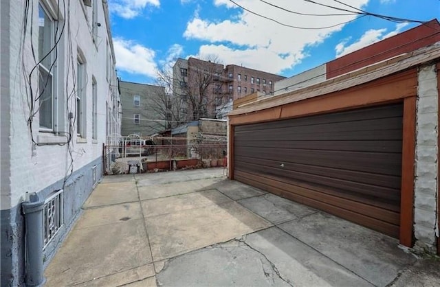 view of patio featuring a garage