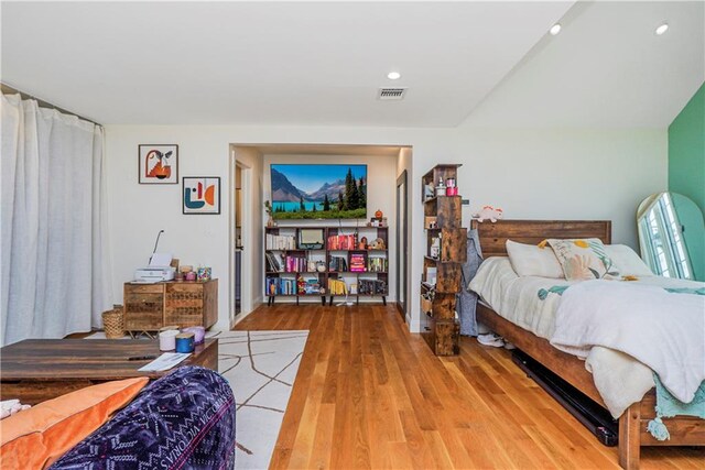 bedroom featuring hardwood / wood-style floors