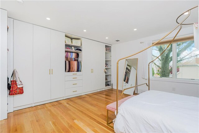 bedroom featuring hardwood / wood-style flooring