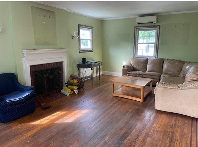 living room featuring dark wood-type flooring, a brick fireplace, and plenty of natural light