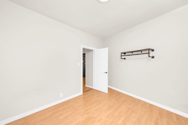 unfurnished room featuring light hardwood / wood-style flooring