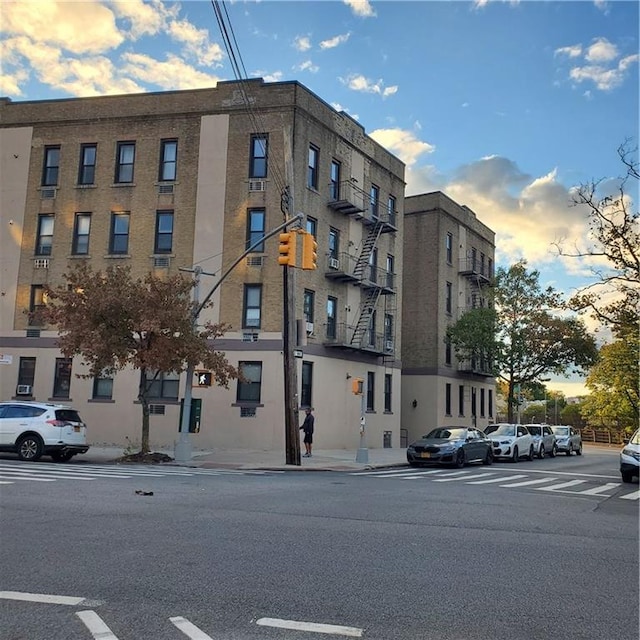 view of outdoor building at dusk