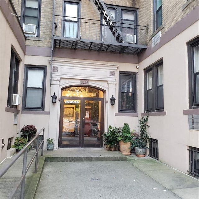 doorway to property with french doors and a balcony