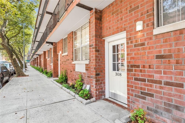 property entrance with a balcony