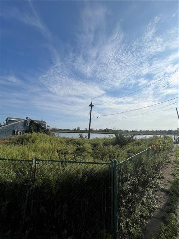 exterior space with a water view