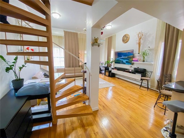 stairway featuring hardwood / wood-style flooring