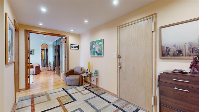 entryway with light hardwood / wood-style flooring