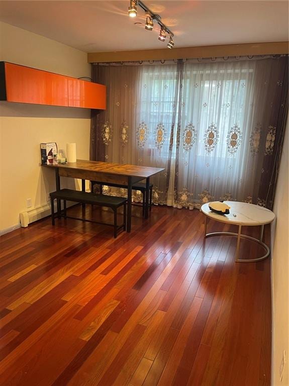 dining space featuring hardwood / wood-style floors