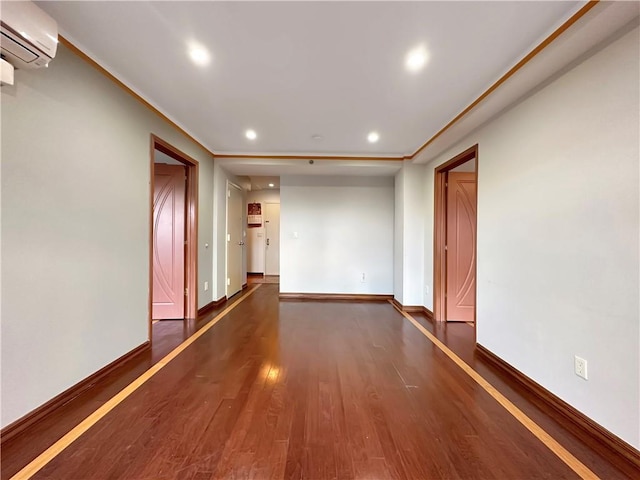 hall with dark hardwood / wood-style flooring and an AC wall unit