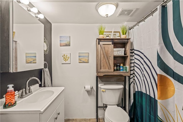 bathroom with vanity, a shower with curtain, and toilet