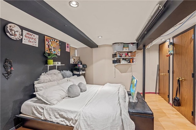 bedroom featuring hardwood / wood-style flooring