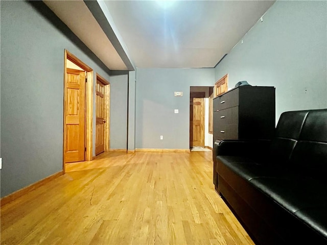 unfurnished room with light wood-type flooring