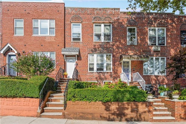 multi unit property featuring brick siding