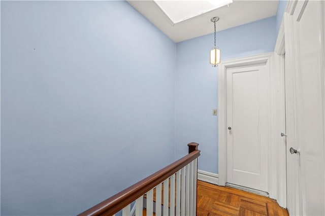 corridor featuring parquet floors