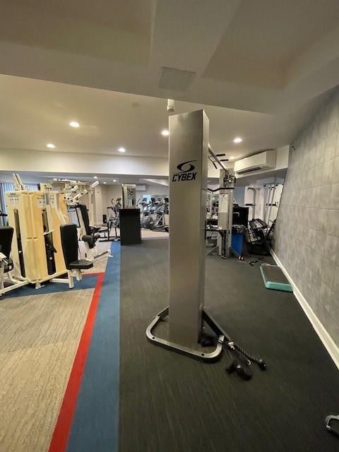 gym with an AC wall unit