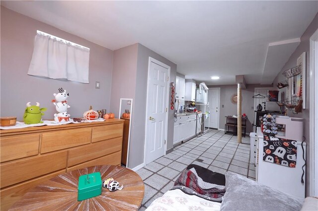 dining space featuring light tile patterned floors