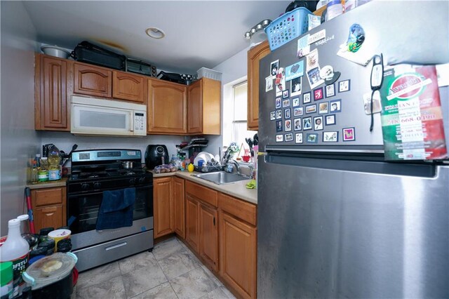 kitchen with sink and stainless steel appliances