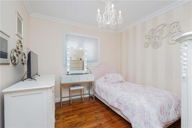 bedroom with an inviting chandelier, ornamental molding, and dark hardwood / wood-style floors