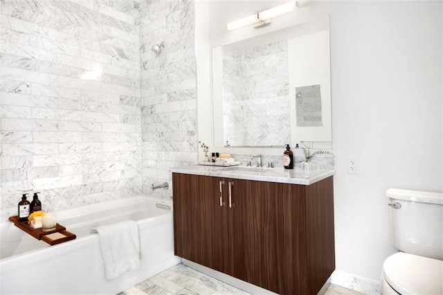 full bathroom featuring tiled shower / bath combo, vanity, and toilet