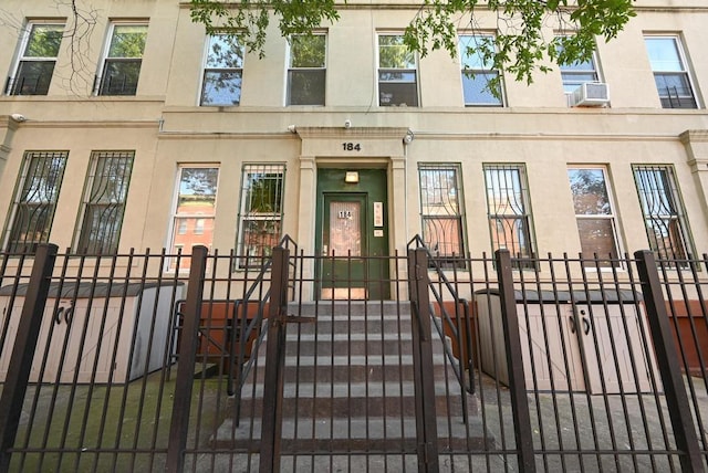 184 Hull St Unit C, Brooklyn, NY 11233 - property entrance with a gate and cooling unit