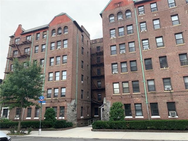 view of building exterior with cooling unit