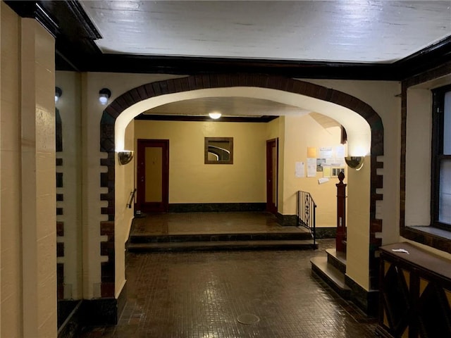 hallway featuring crown molding