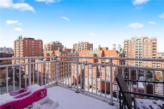 balcony featuring a city view