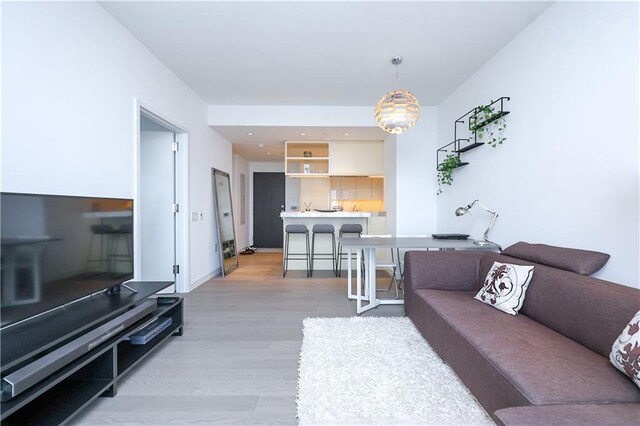 living room with wood-type flooring