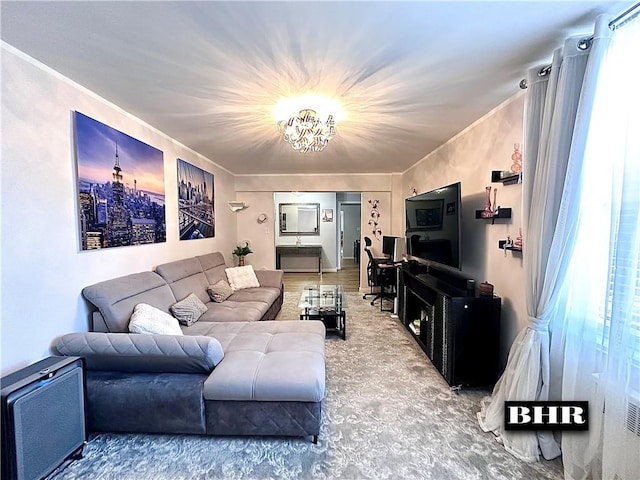 living room with an inviting chandelier